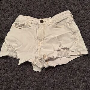 White shorts with rips